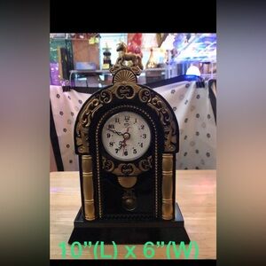 Elegant Black and Gold Decorative Clock